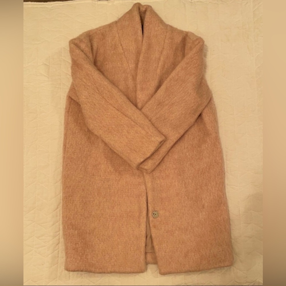 Never worn because it was too big on me.